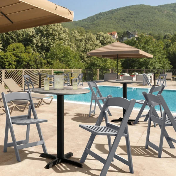 The Eli Slatted Outdoor Resin Folding Chair