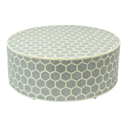Mesa de centro redonda con diseño de panal y incrustaciones de hueso
