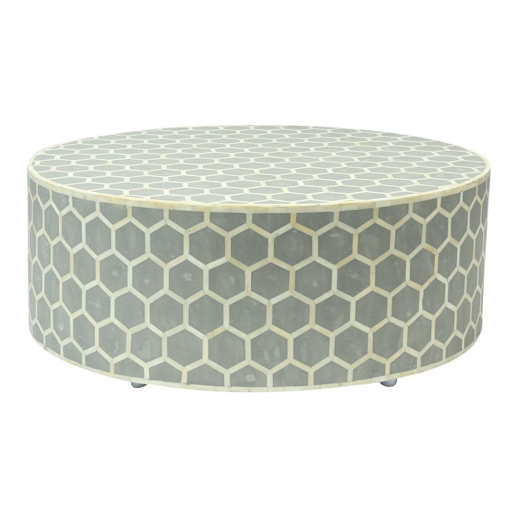 Mesa de centro redonda con diseño de panal y incrustaciones de hueso